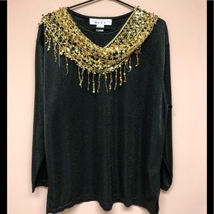 Simple & elegant metallic top. Gold scarf around the neck is separate. Holiday!